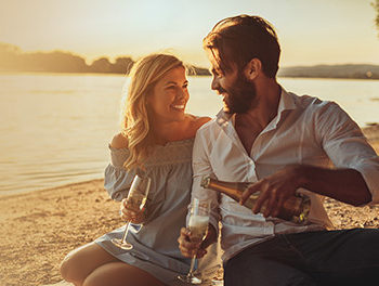 Couple celebrating anniversary having a picnic