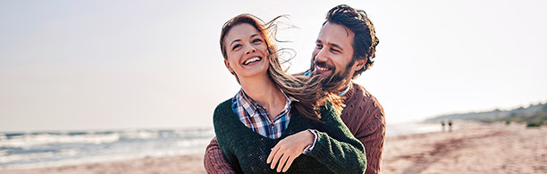 man and woman on beach