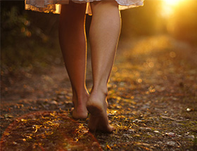 lady walking barefoot