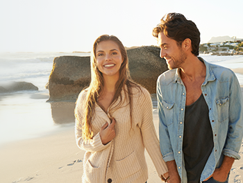 Couple walking on the beach