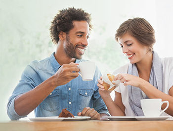 Couple on a first date in a cafe