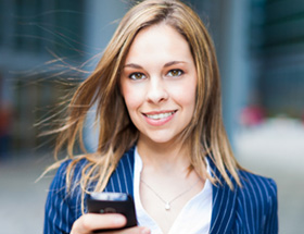 woman looking at smartphone