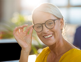 smiling older woman with glasses