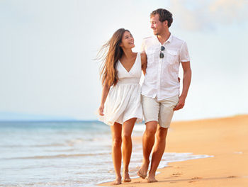 couple walking on a beach