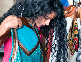 indian woman picking sari