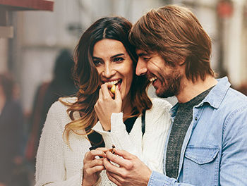 Happy couple laughing on a date